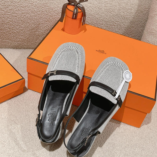 INFINIE 50 PUMP BLACK AND WHITE LAMBSKIN