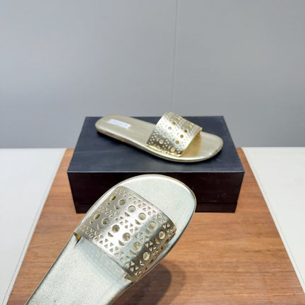 ALAIA FLAT SANDALS WITH PERFORATED STRAPS 25S IN GOLD LAMBSKIN