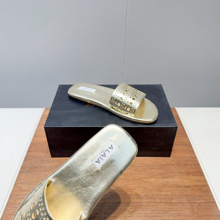 ALAIA FLAT SANDALS WITH PERFORATED STRAPS 25S IN GOLD LAMBSKIN