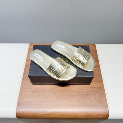 ALAIA FLAT SANDALS WITH PERFORATED STRAPS 25S IN GOLD LAMBSKIN