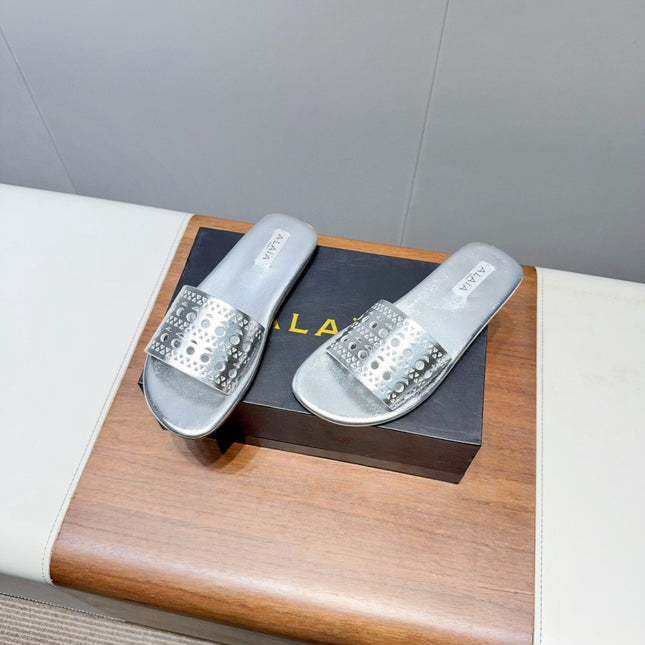 ALAIA FLAT SANDALS WITH PERFORATED STRAPS 25S IN SILVER LAMBSKIN