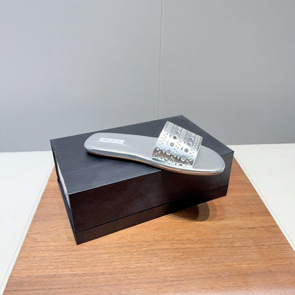 ALAIA FLAT SANDALS WITH PERFORATED STRAPS 25S IN SILVER LAMBSKIN