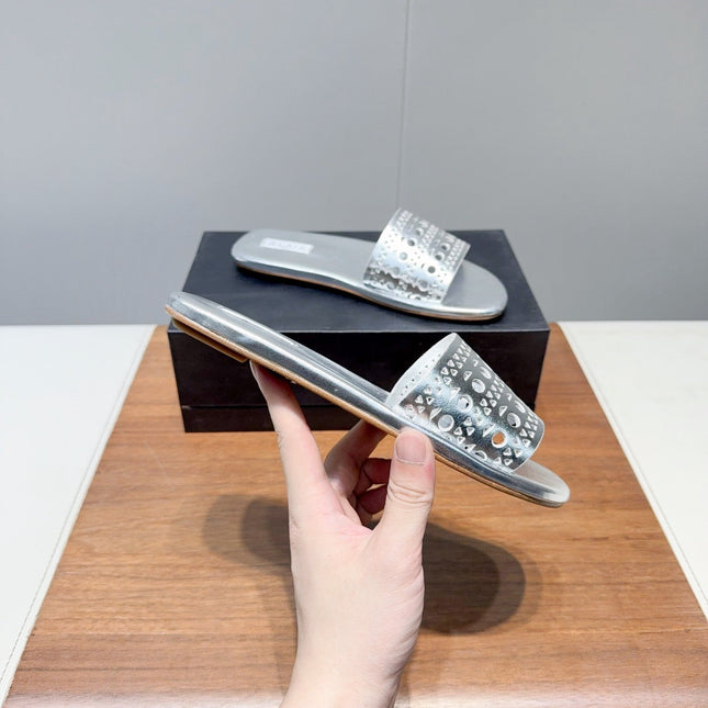 ALAIA FLAT SANDALS WITH PERFORATED STRAPS 25S IN SILVER LAMBSKIN