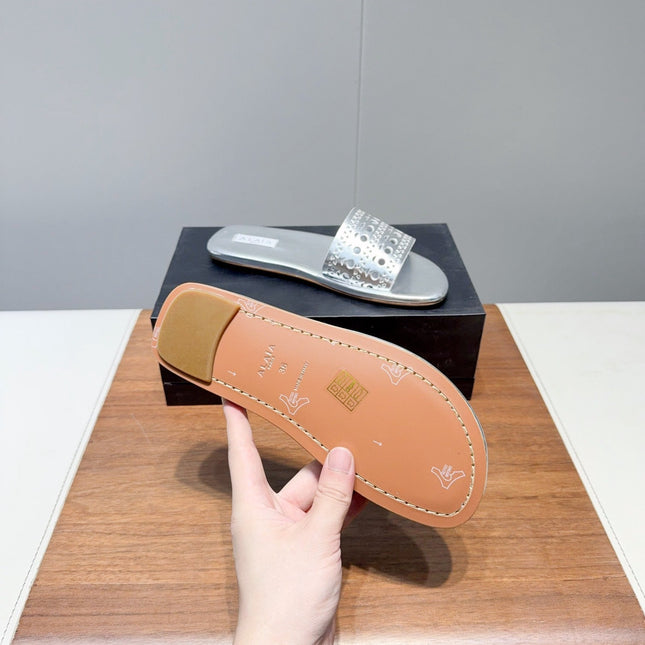 ALAIA FLAT SANDALS WITH PERFORATED STRAPS 25S IN SILVER LAMBSKIN