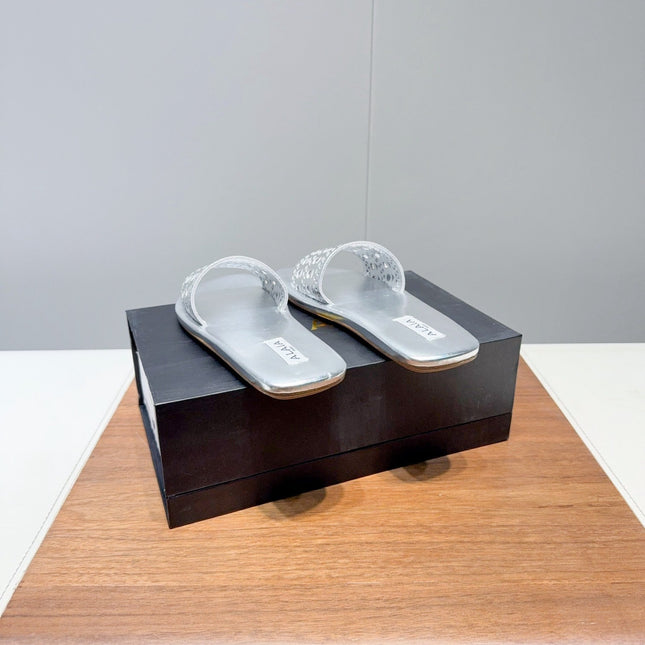 ALAIA FLAT SANDALS WITH PERFORATED STRAPS 25S IN SILVER LAMBSKIN