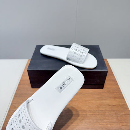 ALAIA FLAT SANDALS WITH PERFORATED STRAPS 25S IN WHITE LAMBSKIN