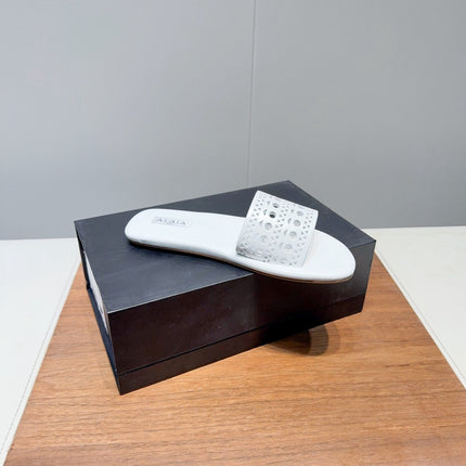 ALAIA FLAT SANDALS WITH PERFORATED STRAPS 25S IN WHITE LAMBSKIN