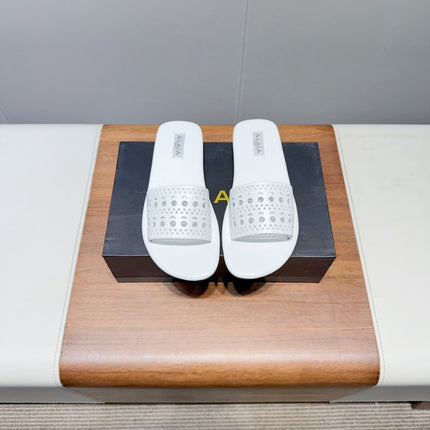 ALAIA FLAT SANDALS WITH PERFORATED STRAPS 25S IN WHITE LAMBSKIN
