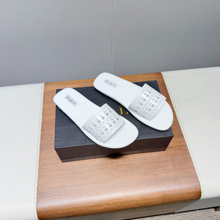 ALAIA FLAT SANDALS WITH PERFORATED STRAPS 25S IN WHITE LAMBSKIN