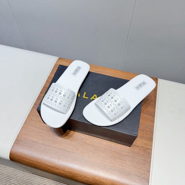 ALAIA FLAT SANDALS WITH PERFORATED STRAPS 25S IN WHITE LAMBSKIN