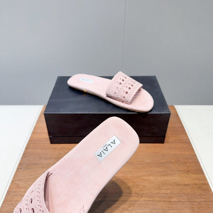 ALAIA FLAT SANDALS WITH PERFORATED STRAPS 25S IN LIGHT PINK SUEDE