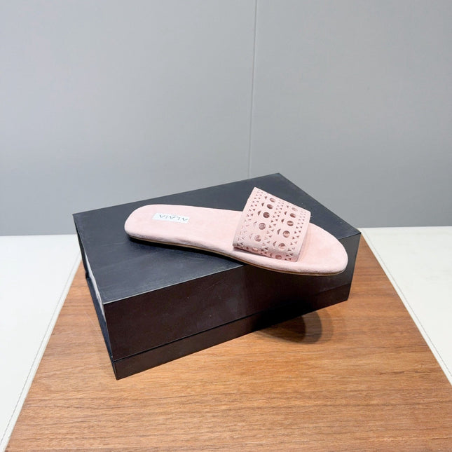 ALAIA FLAT SANDALS WITH PERFORATED STRAPS 25S IN LIGHT PINK SUEDE