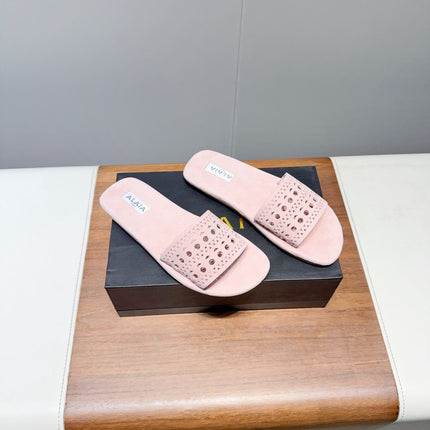 ALAIA FLAT SANDALS WITH PERFORATED STRAPS 25S IN LIGHT PINK SUEDE