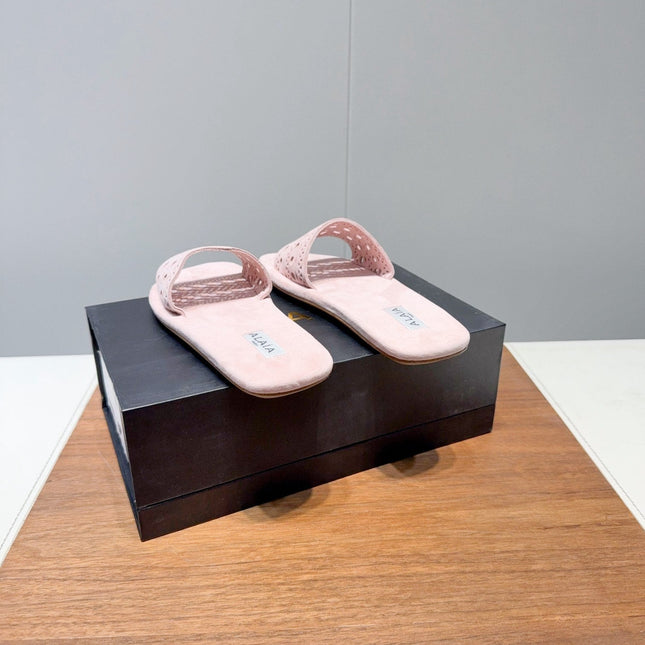 ALAIA FLAT SANDALS WITH PERFORATED STRAPS 25S IN LIGHT PINK SUEDE