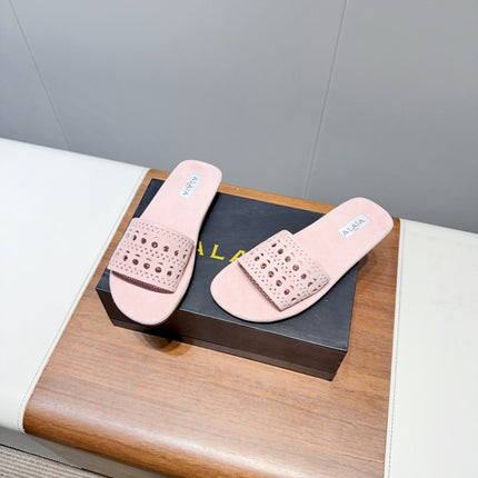 ALAIA FLAT SANDALS WITH PERFORATED STRAPS 25S IN LIGHT PINK SUEDE