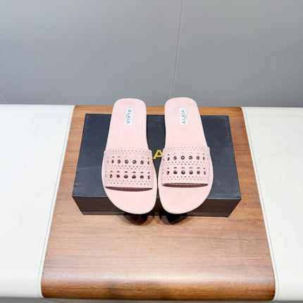 ALAIA FLAT SANDALS WITH PERFORATED STRAPS 25S IN LIGHT PINK SUEDE
