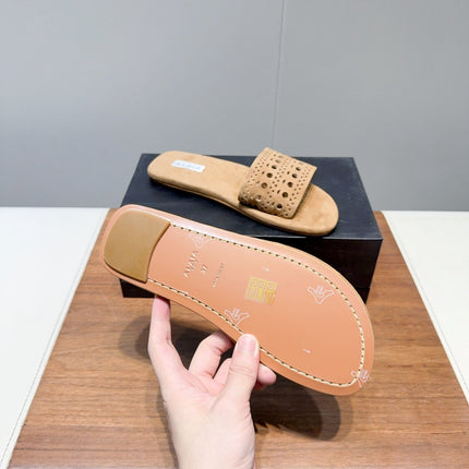 ALAIA FLAT SANDALS WITH PERFORATED STRAPS 25S IN BEIGE SUEDE