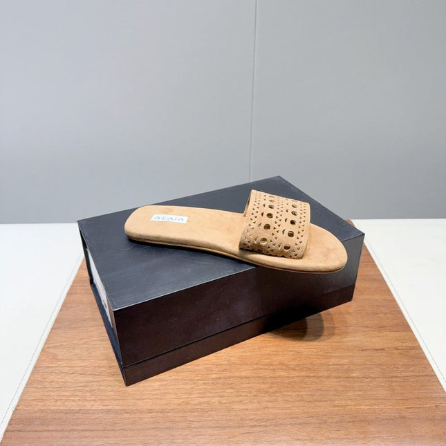 ALAIA FLAT SANDALS WITH PERFORATED STRAPS 25S IN BEIGE SUEDE