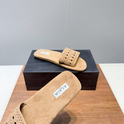 ALAIA FLAT SANDALS WITH PERFORATED STRAPS 25S IN BEIGE SUEDE