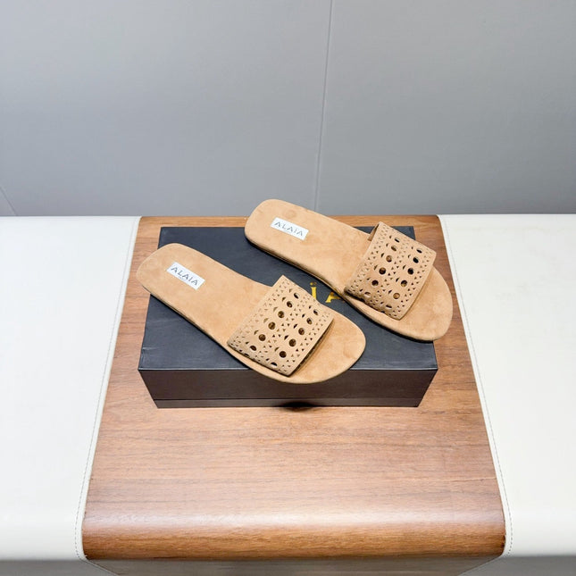 ALAIA FLAT SANDALS WITH PERFORATED STRAPS 25S IN BEIGE SUEDE