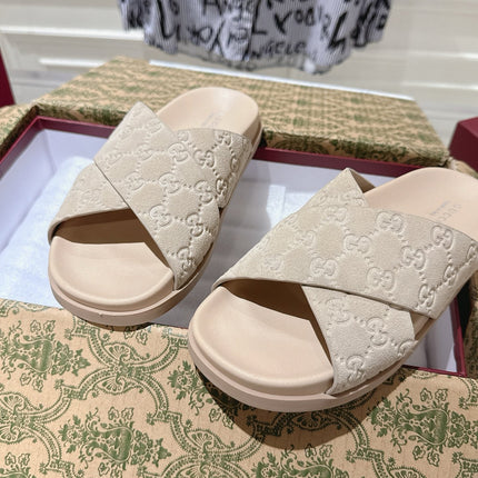 GG SLIDES IN NUDE BEIGE SUEDE WITH EMBOSSED LOGO STYLE 7