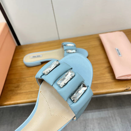 FLAT SLIDE IN LIGHT BLUE CALFSKIN