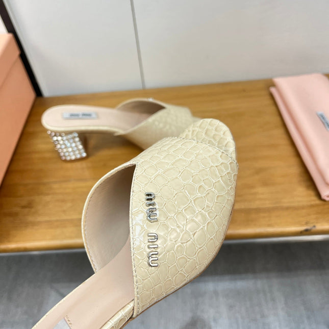 JEWELLED HEEL 55 MULE SANDALS IN PALE YELLOW CALFSKIN
