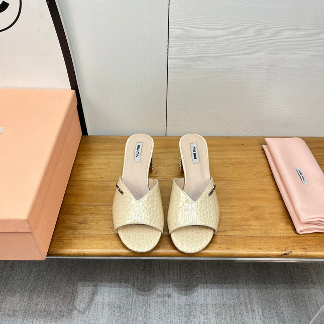 JEWELLED HEEL 55 MULE SANDALS IN PALE YELLOW CALFSKIN