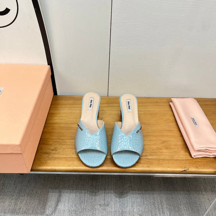 JEWELLED HEEL 55 MULE SANDALS IN LIGHT BLUE CALFSKIN