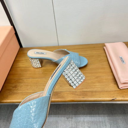 JEWELLED HEEL 55 MULE SANDALS IN LIGHT BLUE CALFSKIN