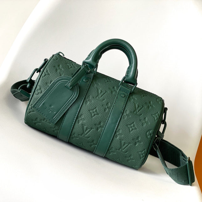 KEEPALL BANDOULIÈRE 25 IN FOREST GREEN MONOGRAM EMBOSSED CALFSKIN