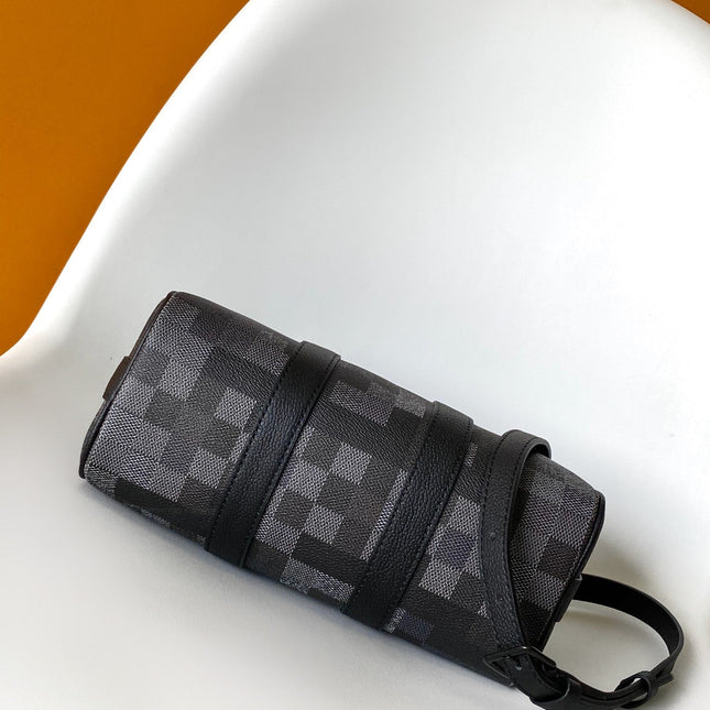 LV 25S KEEPALL BANDOULIÈRE 25 BAG IN DAMOFLAGE BLACK CALFSKIN