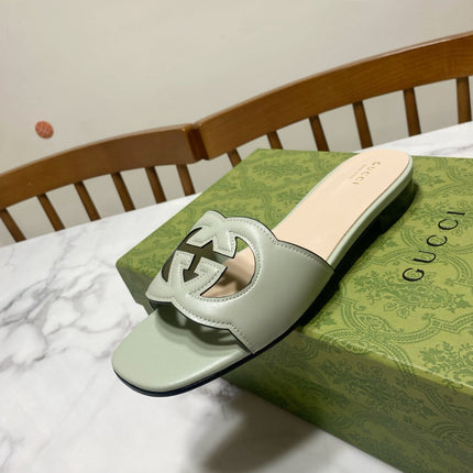 INTERLOCKING G SLIDE SANDAL IN PASTEL GREEN AND BEIGE CALFSKIN