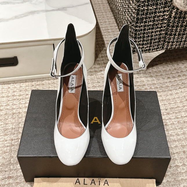 ALAIA ROUND-TOE HIGH HEELS 10 CM IN WHITE CALFSKIN