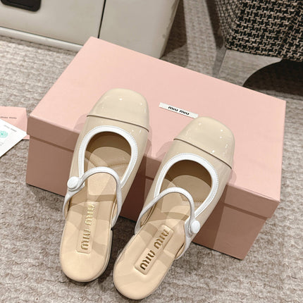 FLAT MULE IN BISQUE BEIGE PATENT CALFSKIN