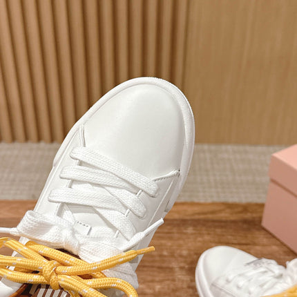 MM SNEAKERS IN WHITE CALFSKIN WITH YELLOW LACES