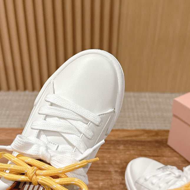 MM SNEAKERS IN WHITE CALFSKIN WITH YELLOW LACES