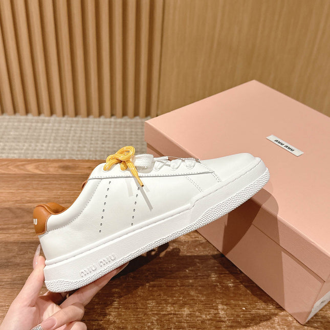 MM SNEAKERS IN WHITE CALFSKIN WITH YELLOW LACES