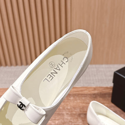 CHANEL 25S BALLET MARY JANES BLACK AND IVORY IN CALFSKIN