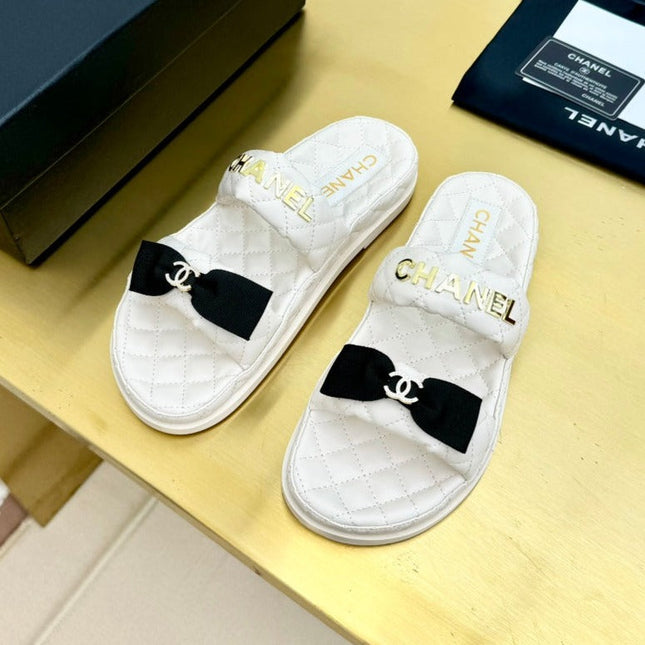 DAD SANDALS WITH BOW IN WHITE LAMBSKIN MULE