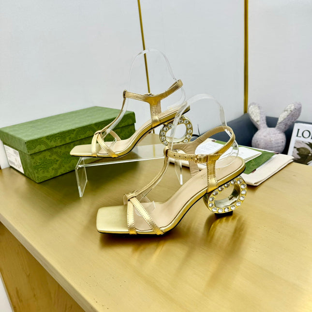 MEDIUM-HEEL SANDAL IN GOLD CALFSKIN GOLD HARDWARE WITH RHINSTONES