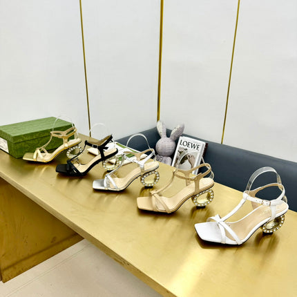 MEDIUM-HEEL SANDAL IN GOLD CALFSKIN GOLD HARDWARE WITH RHINSTONES