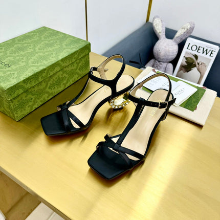 MEDIUM-HEEL SANDAL IN BLACK CALFSKIN GOLD HARDWARE WITH RHINSTONES