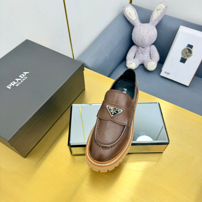 LOAFER WITH TRIANGLE LOGO IN CHOCOLATE BROWN CALFSKIN
