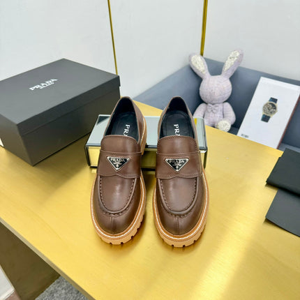 LOAFER WITH TRIANGLE LOGO IN CHOCOLATE BROWN CALFSKIN