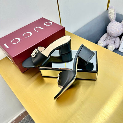 GG HIGH HEELS IN BLACK CALFSKIN GOLD-TONE HARDWARE WITH RHINESTONES