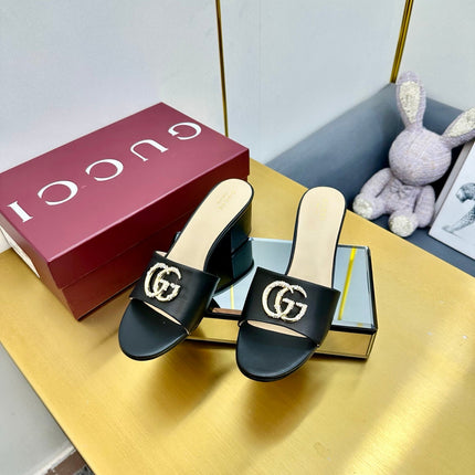 GG HIGH HEELS IN BLACK CALFSKIN GOLD-TONE HARDWARE WITH RHINESTONES