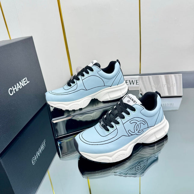 TRAINERS SNEAKER IN LIGHT BLUE CALFSKIN WITH BLACK EMBROIDERED