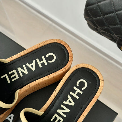 THICK SOLE LETTER SLIPPERS IN BLACK SHEEPSKIN