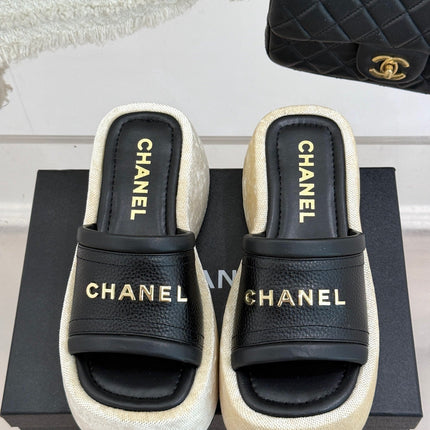 PLATFORM SLIPPERS IN BLACK LAMBSKIN